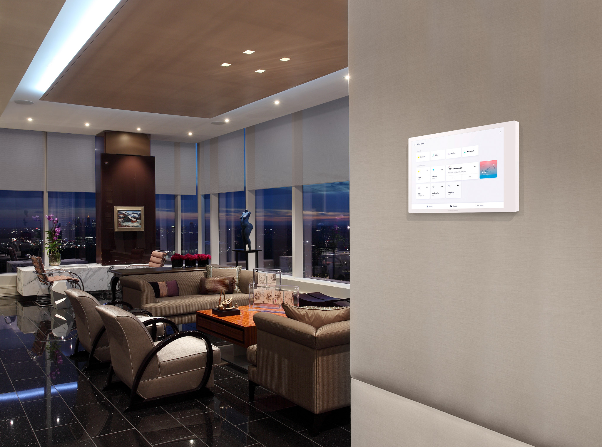 Control4 Touch panel in a able with a traditional home in the background