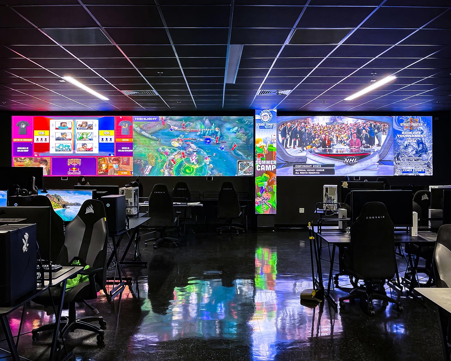 eSports training center with multiple MicroLED walls showing live gaming feeds